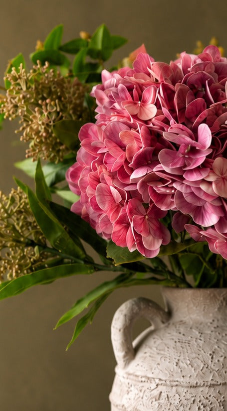 Close-up of the rose hydrangea petals and green berry sprays